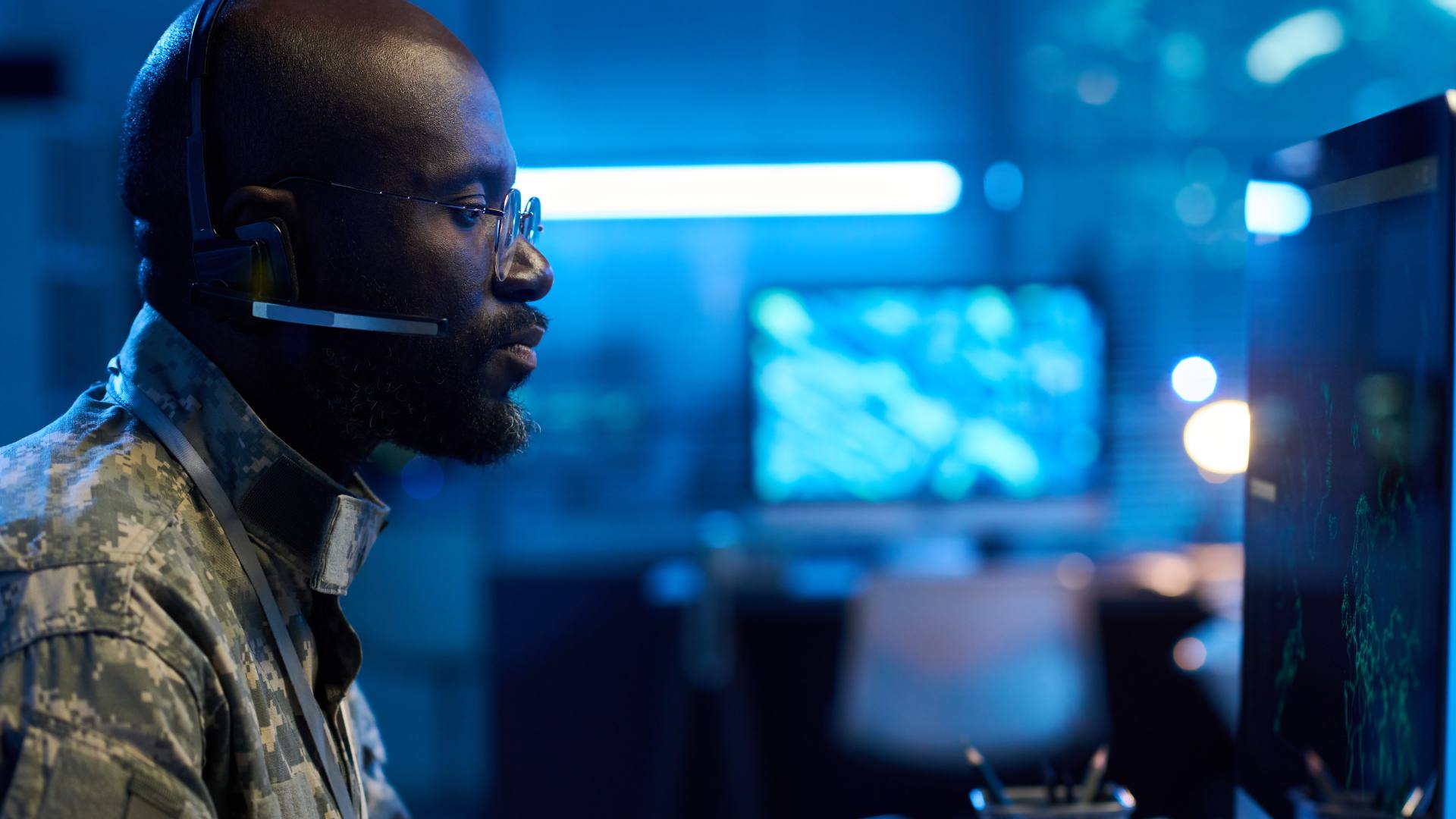 Cybersecurity professional at a workstation